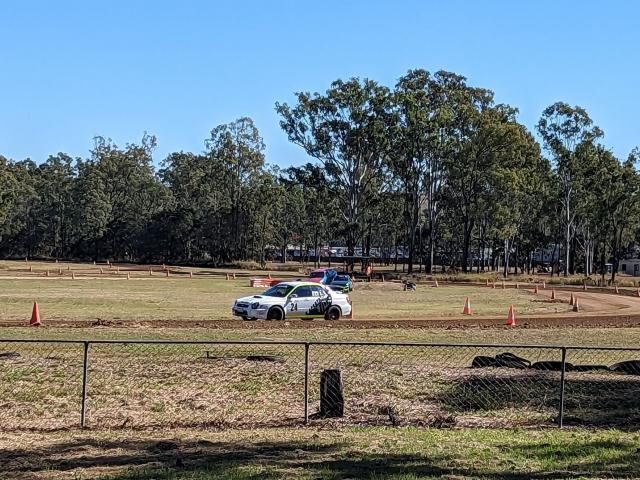 A car running a dirt sprint event